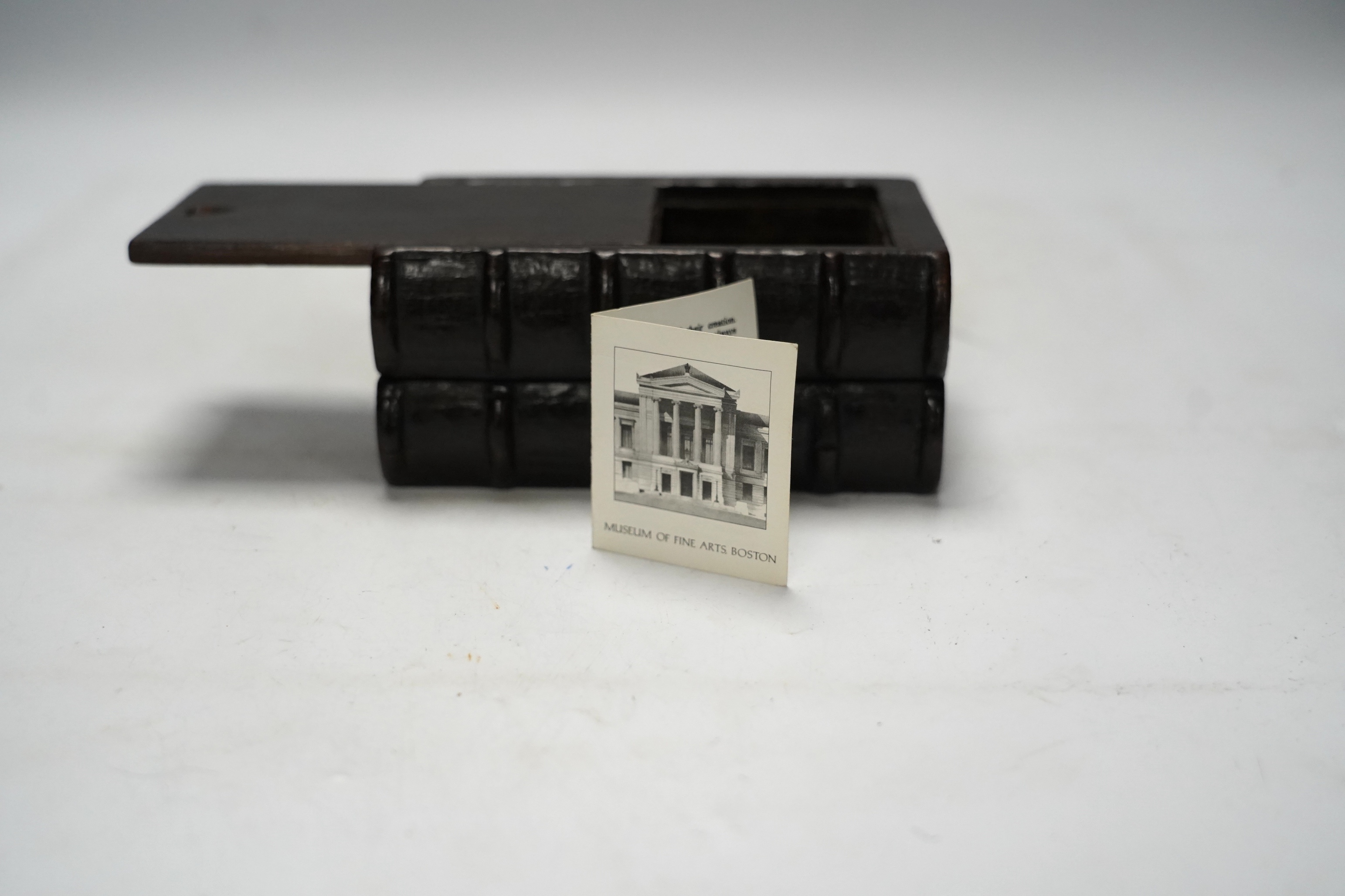 A 19th century novelty treen coin box in the form of two antiquarian books, 15.5cm
